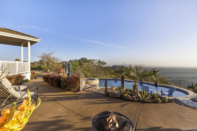 1078 Rainbow Crest Rd, Fallbrook, CA 92028 - view of patio featuring an in-ground hot tub, an outdoor pool, and a fire pit