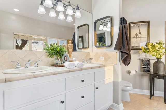 1078 Rainbow Crest Rd, Fallbrook, CA 92028 - full bath featuring tasteful backsplash, double vanity, toilet, tile patterned flooring, and baseboards