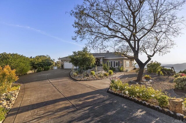 1078 Rainbow Crest Rd, Fallbrook, CA 92028 - view of front facade with concrete driveway and stucco siding