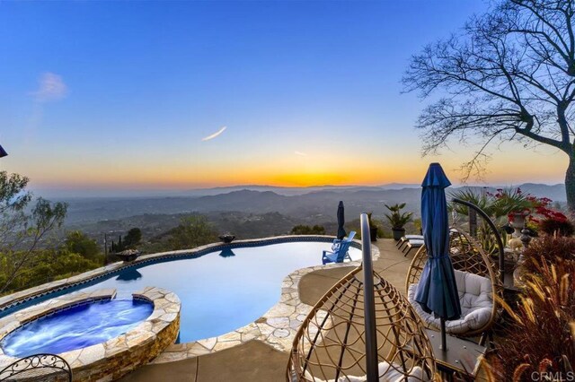 1078 Rainbow Crest Rd, Fallbrook, CA 92028 - view of pool with a mountain view, a pool with connected hot tub, and a patio area