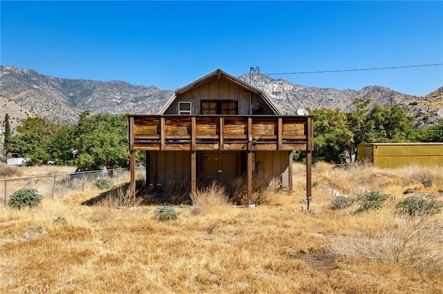 17021 Linda Ln, Onyx, CA 93255 - rear view of property with fence, a deck with mountain view, and a gambrel roof
