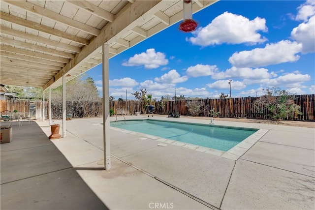 view of pool with a fenced backyard, a fenced in pool, and a patio area