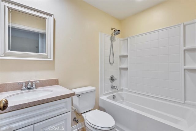 bathroom with toilet, vanity, and bathtub / shower combination