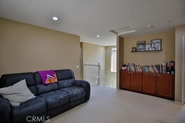 living room with carpet floors and recessed lighting