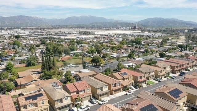 bird's eye view featuring a residential view and a mountain view
