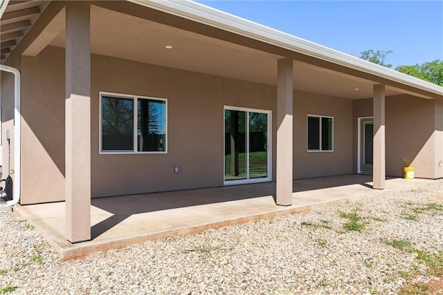1924 Crandall Way, Paradise, CA 95969 - rear view of property with stucco siding and a patio area