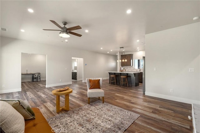 1924 Crandall Way, Paradise, CA 95969 - living area featuring dark wood-style flooring, recessed lighting, and baseboards