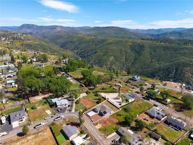 1924 Crandall Way, Paradise, CA 95969 - aerial view of property's location with a mountain backdrop and a heavily wooded area