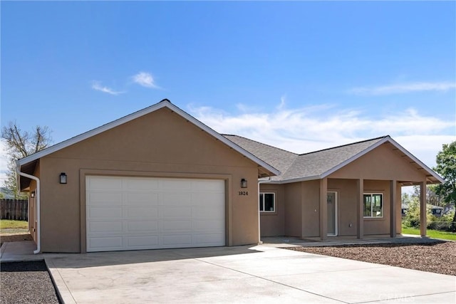 1924 Crandall Way, Paradise, CA 95969 - ranch-style home with stucco siding, driveway, and a garage