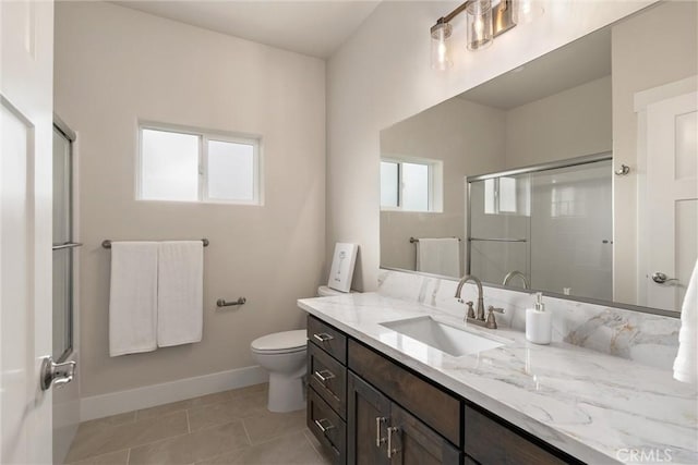 1924 Crandall Way, Paradise, CA 95969 - full bath featuring healthy amount of natural light, vanity, baseboards, and a shower with door