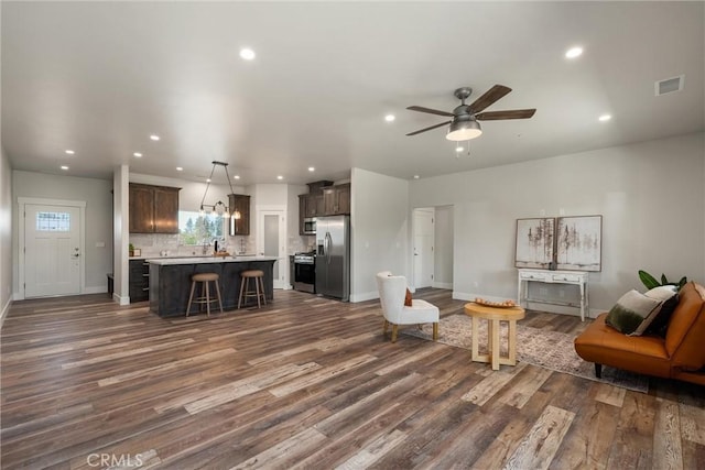 1924 Crandall Way, Paradise, CA 95969 - living area with dark wood finished floors, recessed lighting, baseboards, and a ceiling fan