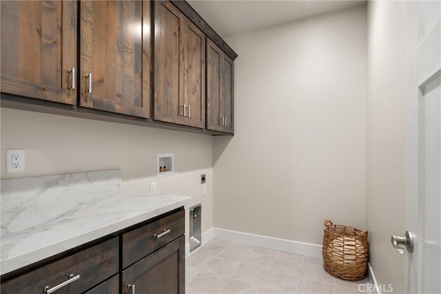 1924 Crandall Way, Paradise, CA 95969 - laundry area featuring cabinet space, hookup for an electric dryer, washer hookup, and baseboards