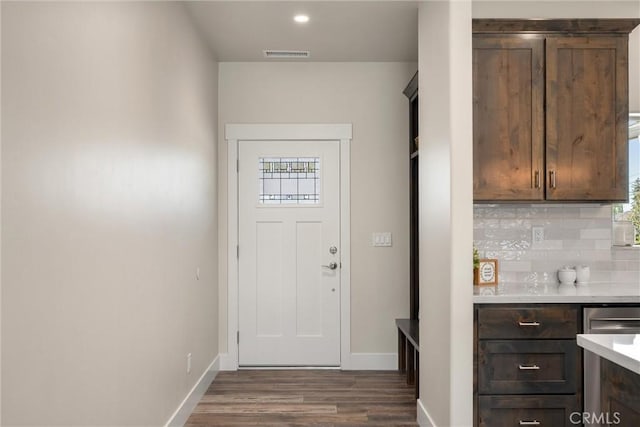 1924 Crandall Way, Paradise, CA 95969 - doorway to outside featuring wood finished floors, healthy amount of natural light, baseboards, and recessed lighting