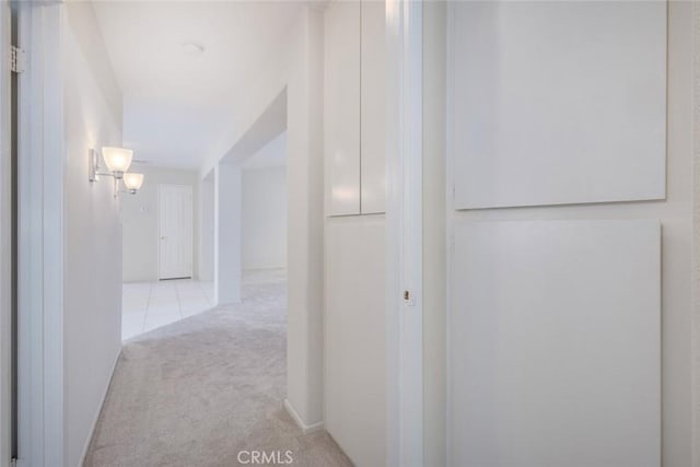hall featuring carpet floors