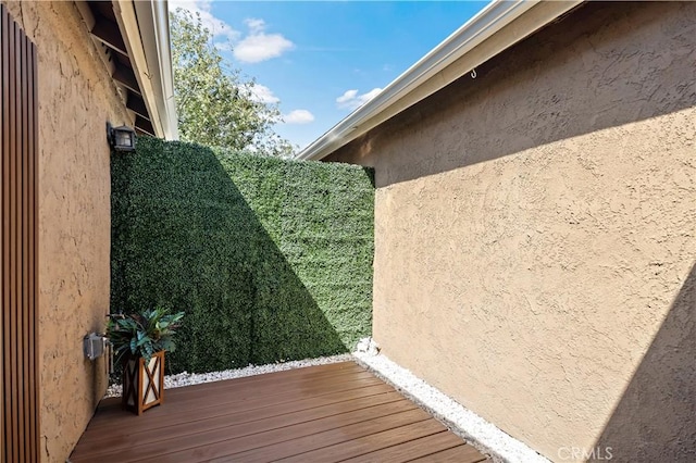 view of side of home featuring stucco siding