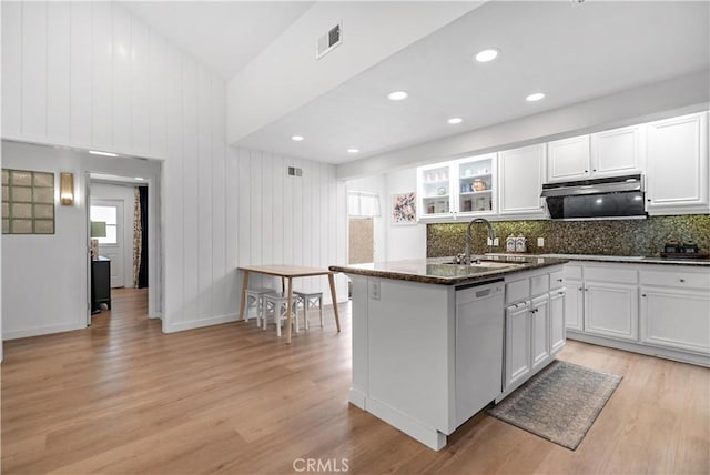 kitchen with light wood-style flooring, white cabinets, extractor fan, white dishwasher, and a sink