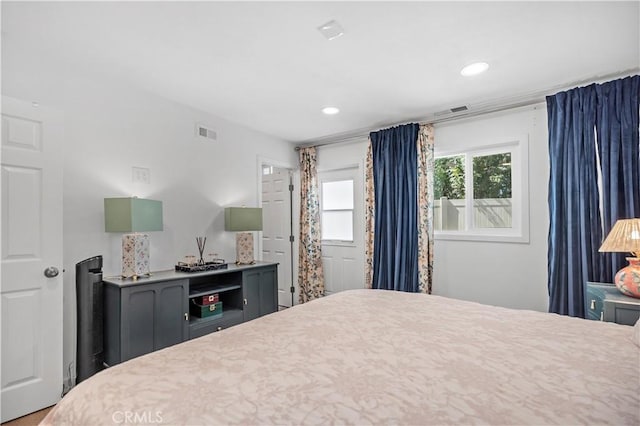 bedroom featuring visible vents and recessed lighting
