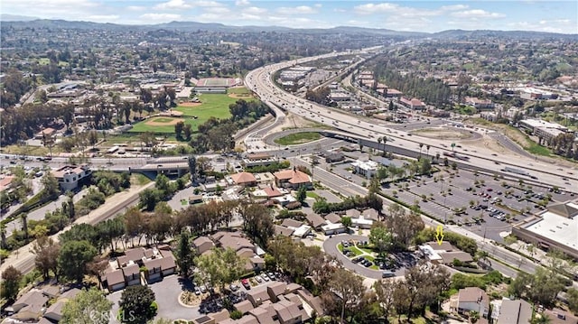 birds eye view of property featuring a residential view and a mountain view