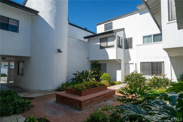 207 Knox St, Costa Mesa, CA 92627 - entrance to property featuring stucco siding