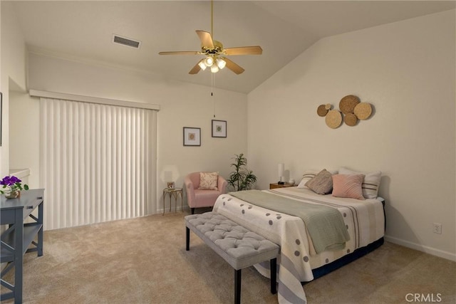carpeted bedroom with visible vents, vaulted ceiling, and ceiling fan