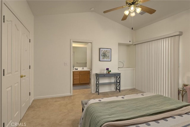 bedroom featuring baseboards, light carpet, ensuite bathroom, visible vents, and lofted ceiling