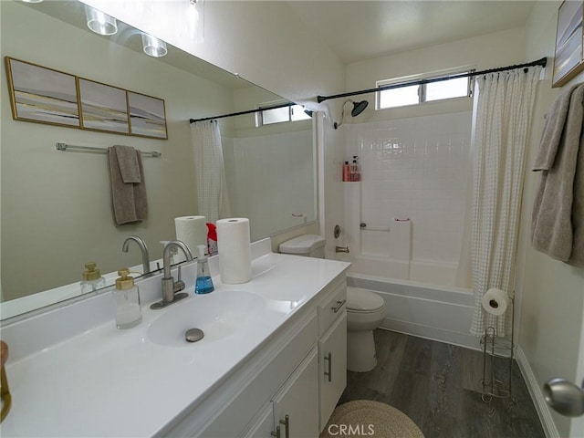 1094 Award Dr, Colton, CA 92324 - full bathroom with toilet, wood finished floors, vanity, and shower / bath combination with curtain