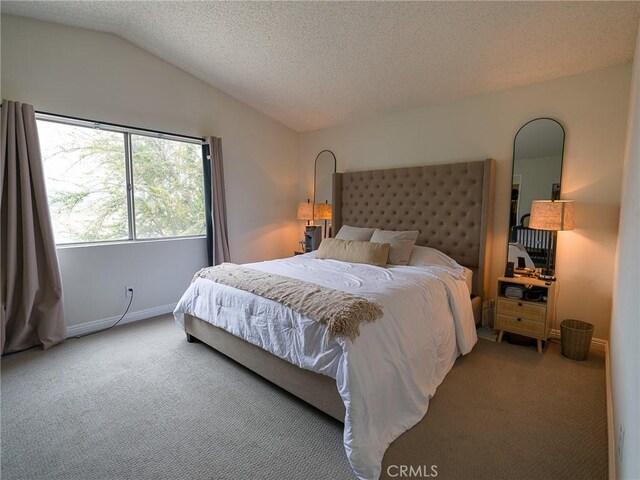 1094 Award Dr, Colton, CA 92324 - bedroom with carpet flooring, lofted ceiling, a textured ceiling, and baseboards