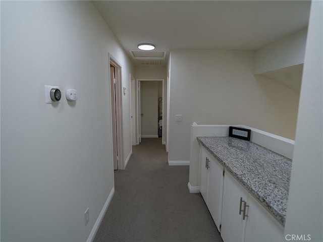 1094 Award Dr, Colton, CA 92324 - hallway with light carpet, baseboards, and attic access