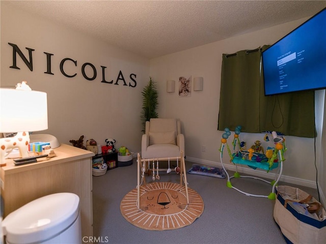 1094 Award Dr, Colton, CA 92324 - rec room featuring carpet flooring, a textured ceiling, and baseboards