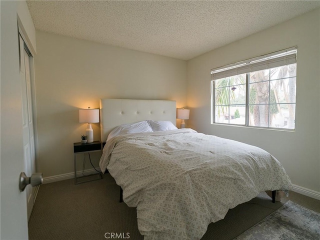 1094 Award Dr, Colton, CA 92324 - carpeted bedroom with baseboards, a textured ceiling, and a closet