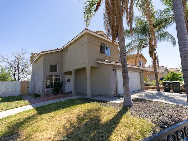 1094 Award Dr, Colton, CA 92324 - mediterranean / spanish-style house with concrete driveway, stucco siding, and a tiled roof
