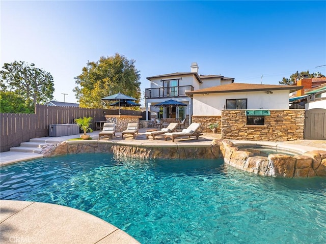 view of swimming pool with a fenced in pool, a patio, an in ground hot tub, and fence private yard