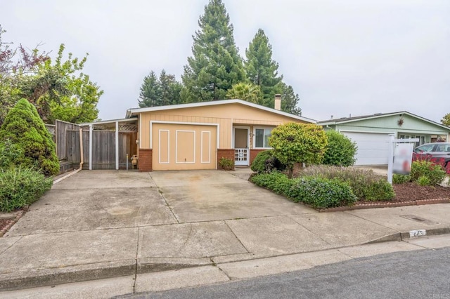 443 Tuttle Ave, Watsonville, CA 95076 - ranch-style house featuring brick siding and concrete driveway