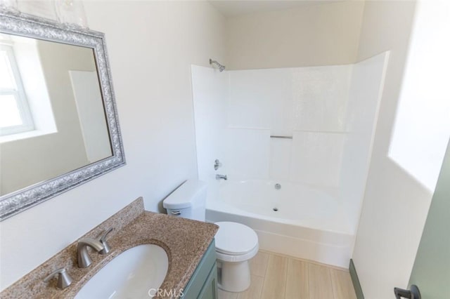 full bathroom with vanity, toilet, and tub / shower combination