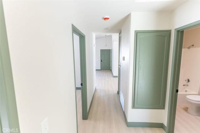 hall with light wood finished floors