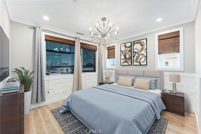 315 Mission Rd, Montebello, CA 90640 - bedroom featuring a chandelier, light wood finished floors, visible vents, and crown molding