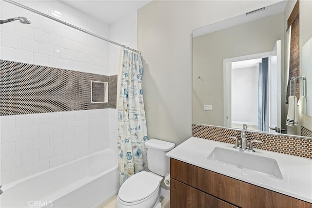 315 Mission Rd, Montebello, CA 90640 - bathroom with visible vents, toilet, shower / bathtub combination with curtain, and vanity
