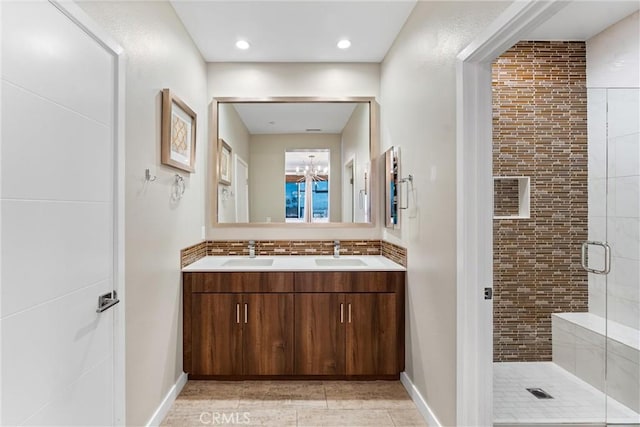 315 Mission Rd, Montebello, CA 90640 - bathroom with a sink, tile patterned floors, a shower stall, and double vanity