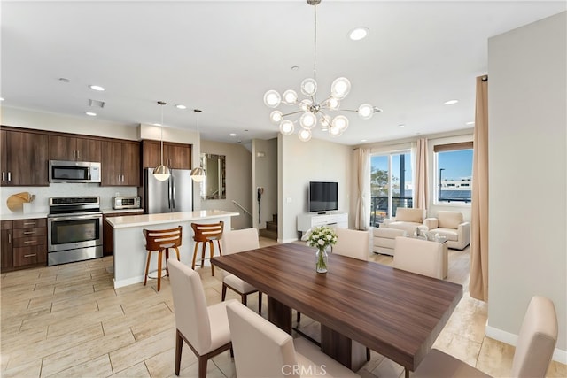 315 Mission Rd, Montebello, CA 90640 - dining space featuring visible vents, a notable chandelier, recessed lighting, and a toaster