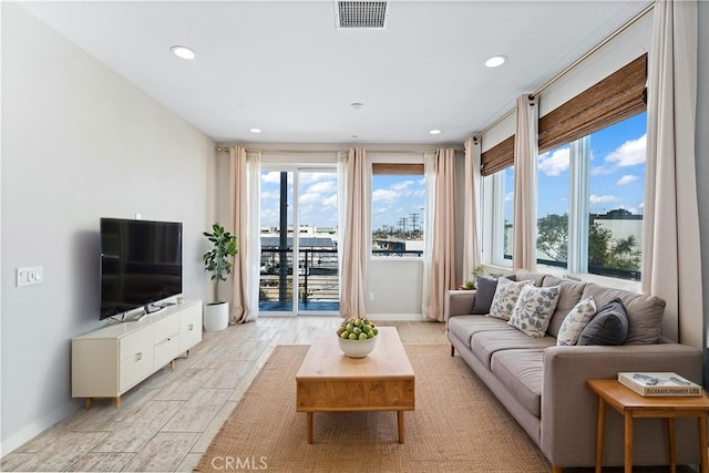 315 Mission Rd, Montebello, CA 90640 - living room featuring baseboards, visible vents, and recessed lighting
