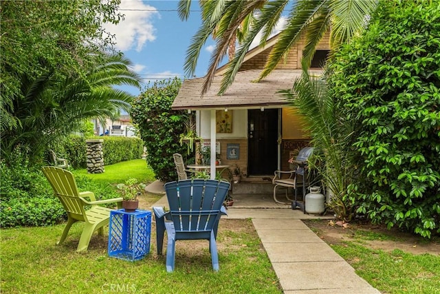 755 E 11th St, Pomona, CA 91766 - entrance to property with a lawn