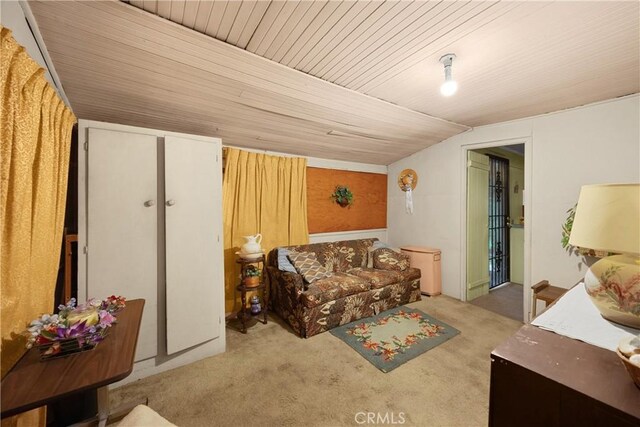755 E 11th St, Pomona, CA 91766 - living area with carpet flooring and vaulted ceiling