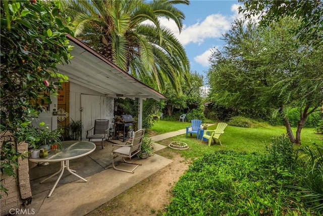 755 E 11th St, Pomona, CA 91766 - view of grassy yard with a patio area