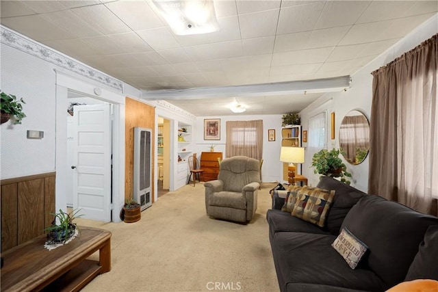 755 E 11th St, Pomona, CA 91766 - carpeted living area with a heating unit, wallpapered walls, wainscoting, and wood walls