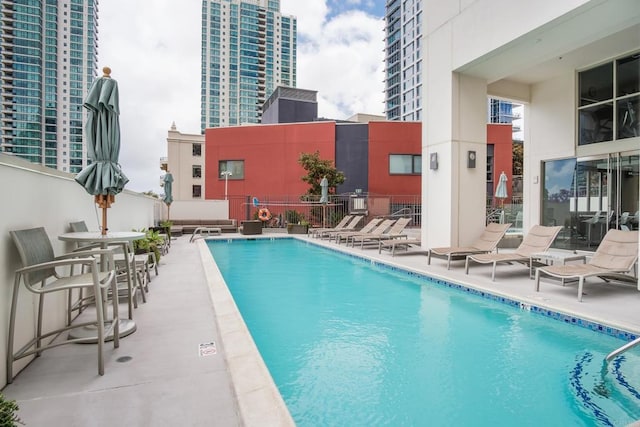 pool with a patio