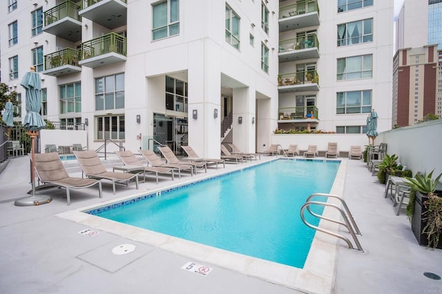 pool with a patio