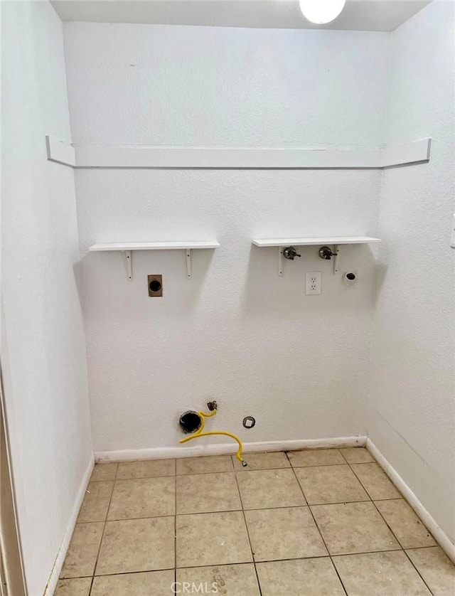 8109 Birch St, Bakersfield, CA 93311 - laundry room featuring hookup for a gas dryer, electric dryer hookup, baseboards, and laundry area