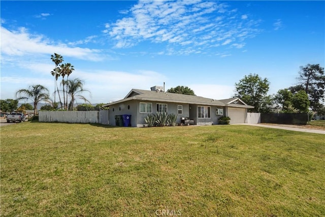single story home with concrete driveway, an attached garage, fence, and stucco siding
