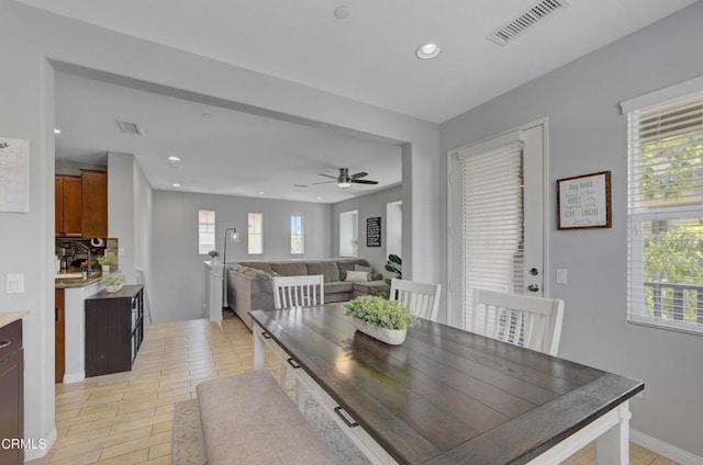 dining area with recessed lighting, plenty of natural light, and visible vents