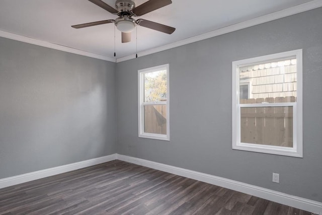 unfurnished room featuring ceiling fan, ornamental molding, baseboards, and dark wood-style floors